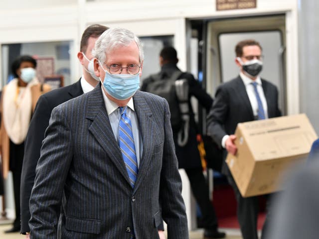 Mitch McConnell arrives before the start of the trial of former US President Donald Trump on Capitol Hill February 9, 2021.