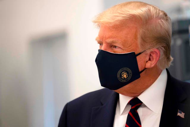 <p>Donald Trump held out for months before wearing a mask in public</p>