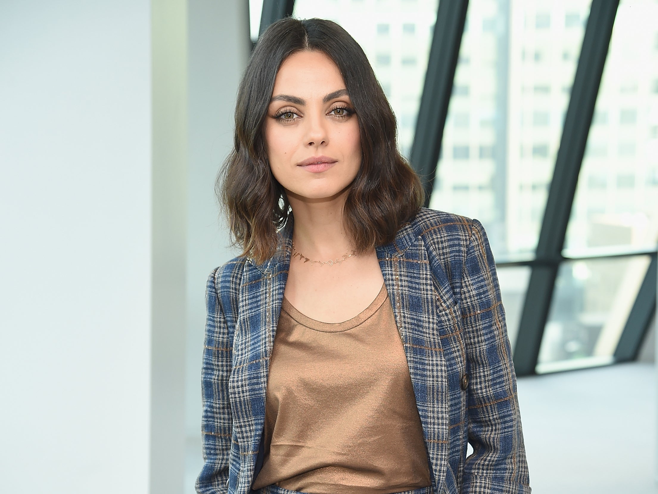 Mila Kunis admits she wanted to ‘get away’ from her children during pandemic