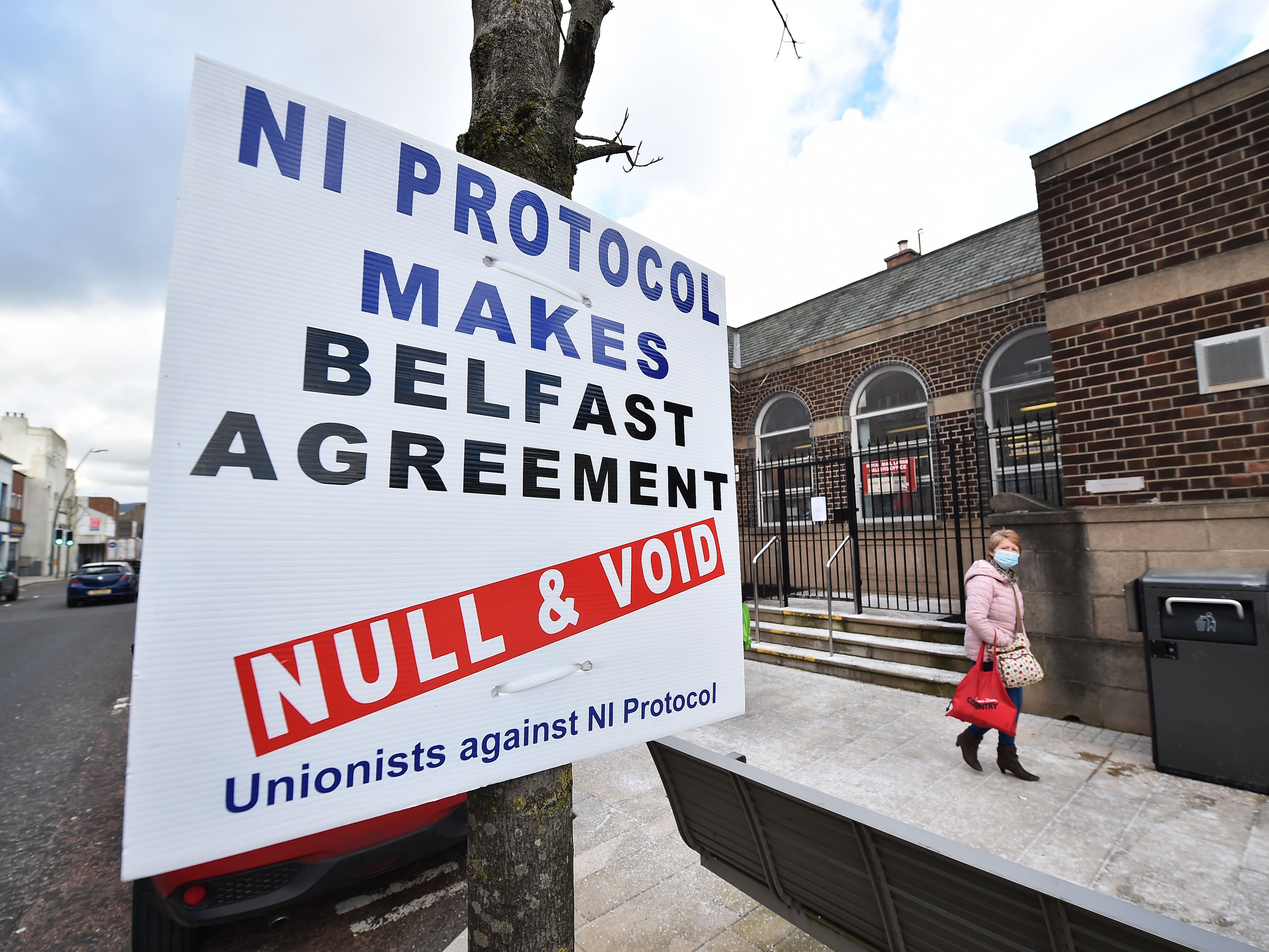 A Unionist sign protesting against the NI Protocol is seen in Larne town centre