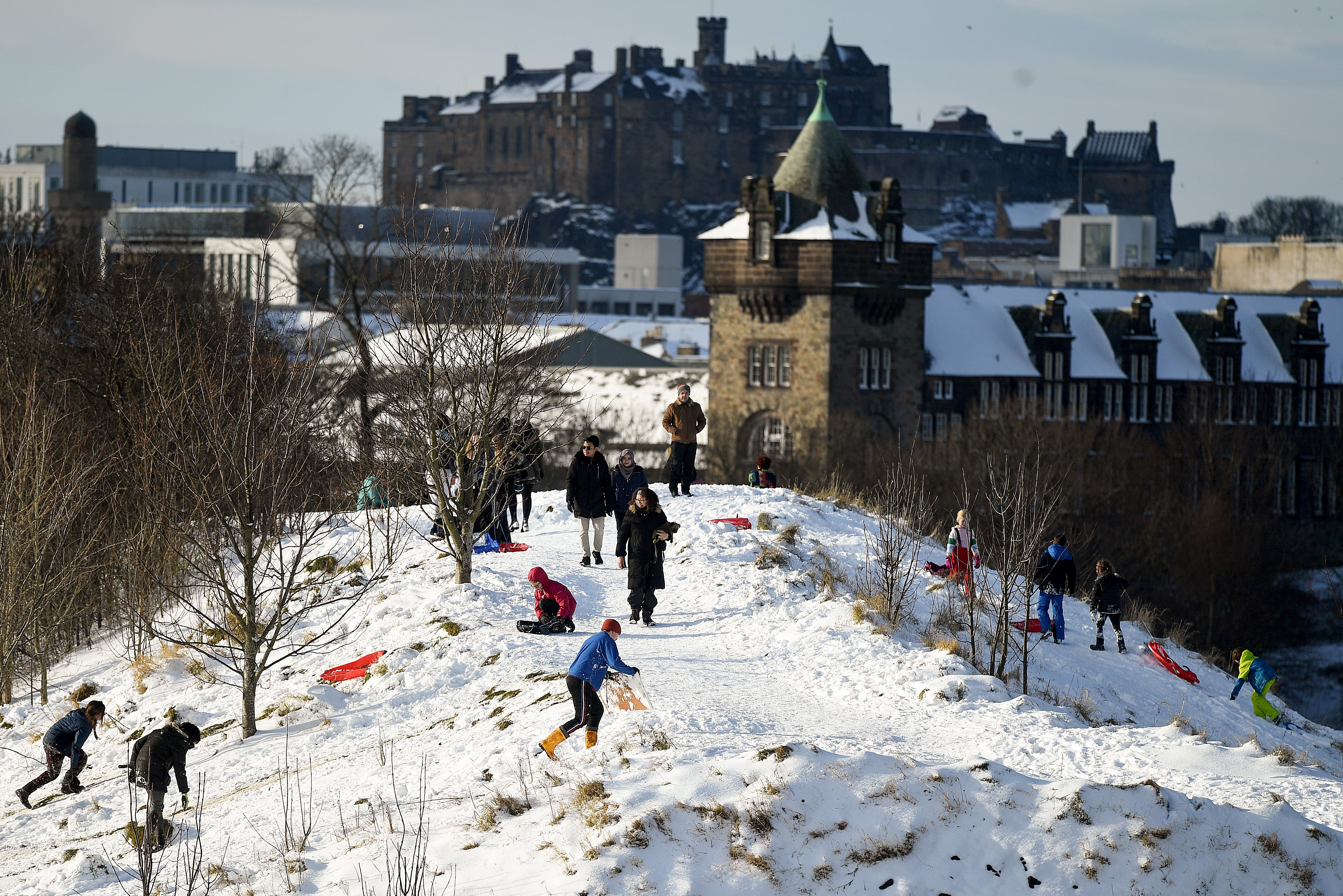 People enjoy the snow in Edinburgh