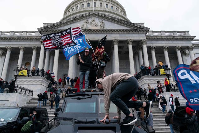 <p>In this file photo taken on January 6, 2021 supporters of US President Donald Trump protest outside the US Capitol in Washington, DC. - Impeachment prosecutors aired terrifying, never-before-seen footage of senior US politicians fleeing for their lives during the January assault on Congress by Donald Trump supporters on day two of the former president’s Senate trial. </p>