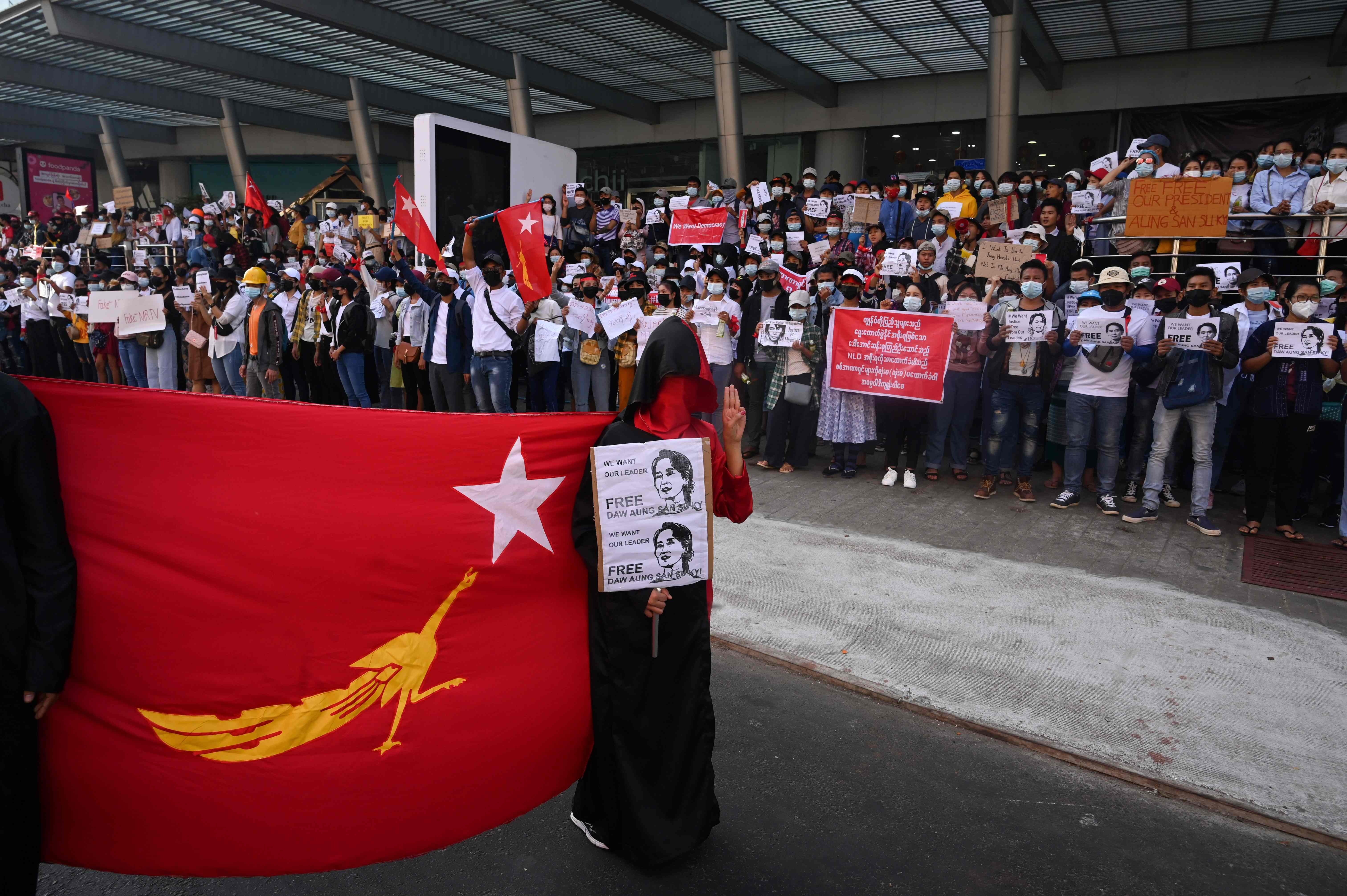 A National League for Democracy flag is pictured at a protest against military rule in Yangon on 11 February