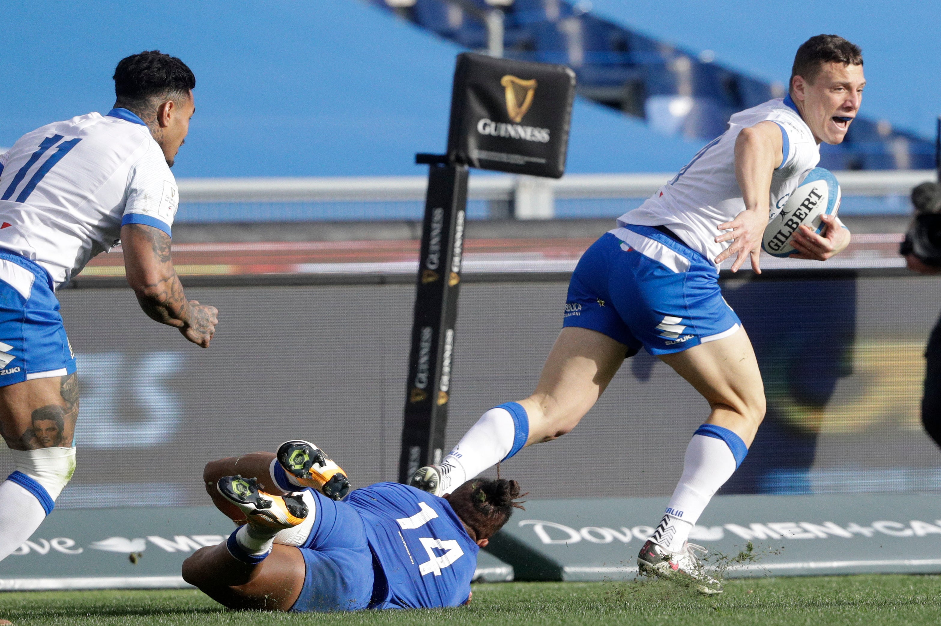 Italy's Paolo Garbisi is tackled by France's Teddy Thomas during the Six Nations