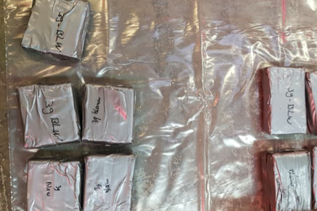 Two Hungarian nationals have been arrested after £12.5 million worth of heroin and cocaine was found in parcels heading to the UK