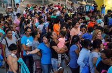 Some asylum-seekers waiting in Mexico to be allowed in US