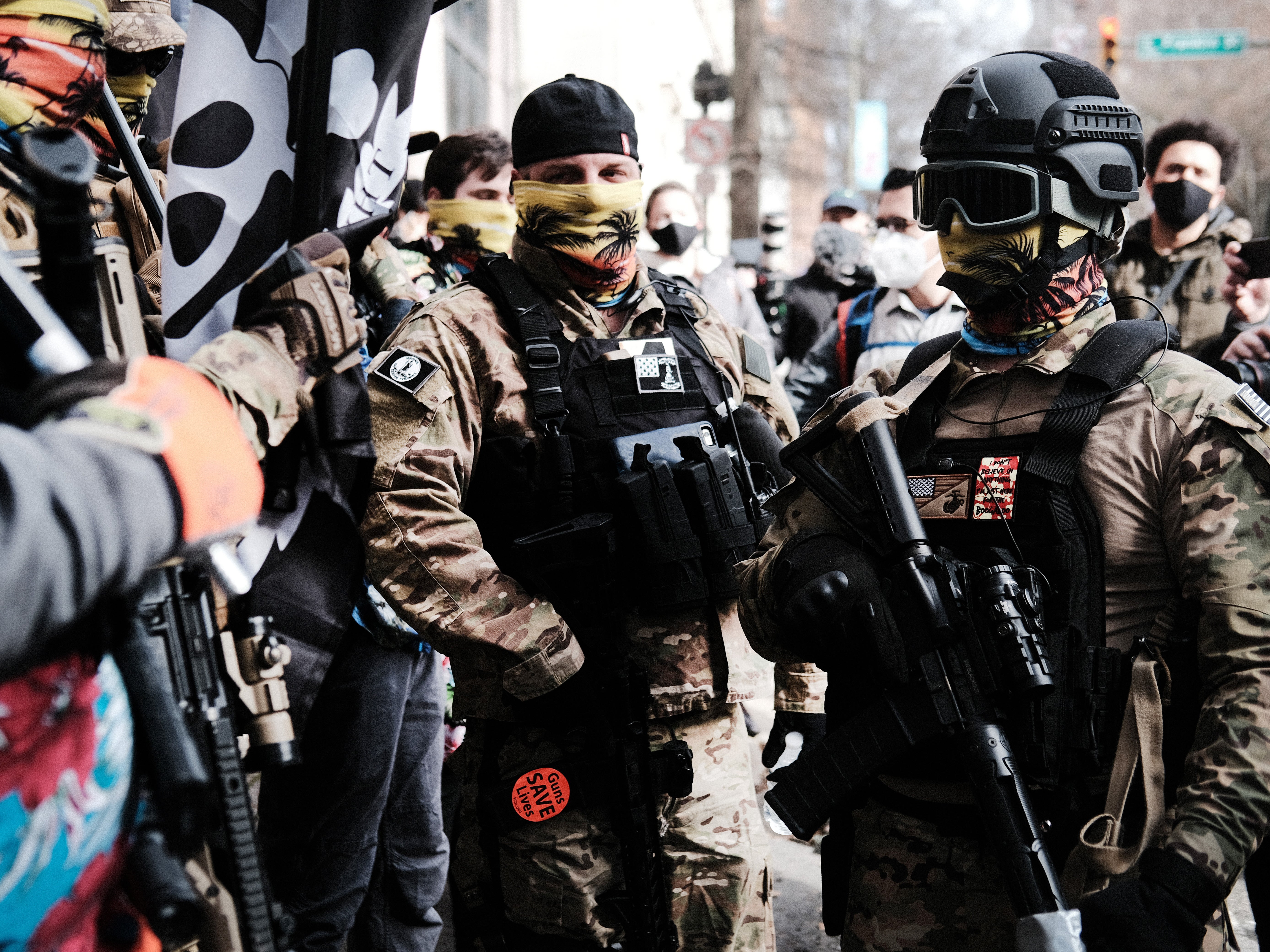 <p>Members of the “boogaloo boys” join other gun rights advocates in front of the State House as pro-gun supporters gather on 18 January 2021 in Richmond, Virginia</p>