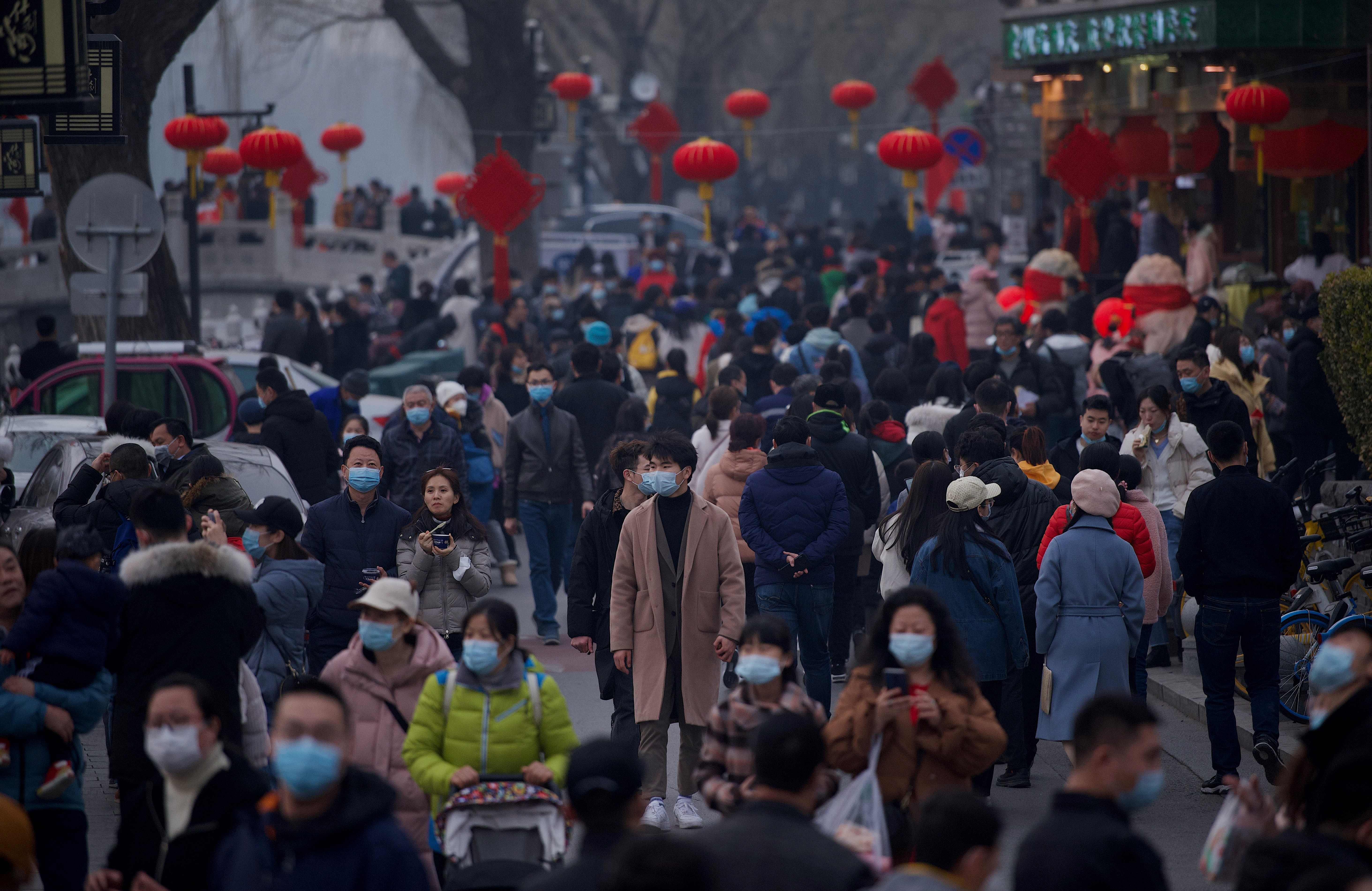 File image: People flock to Houhai lake in Beijing on 12 February, 2021, the first day of the Lunar New Year