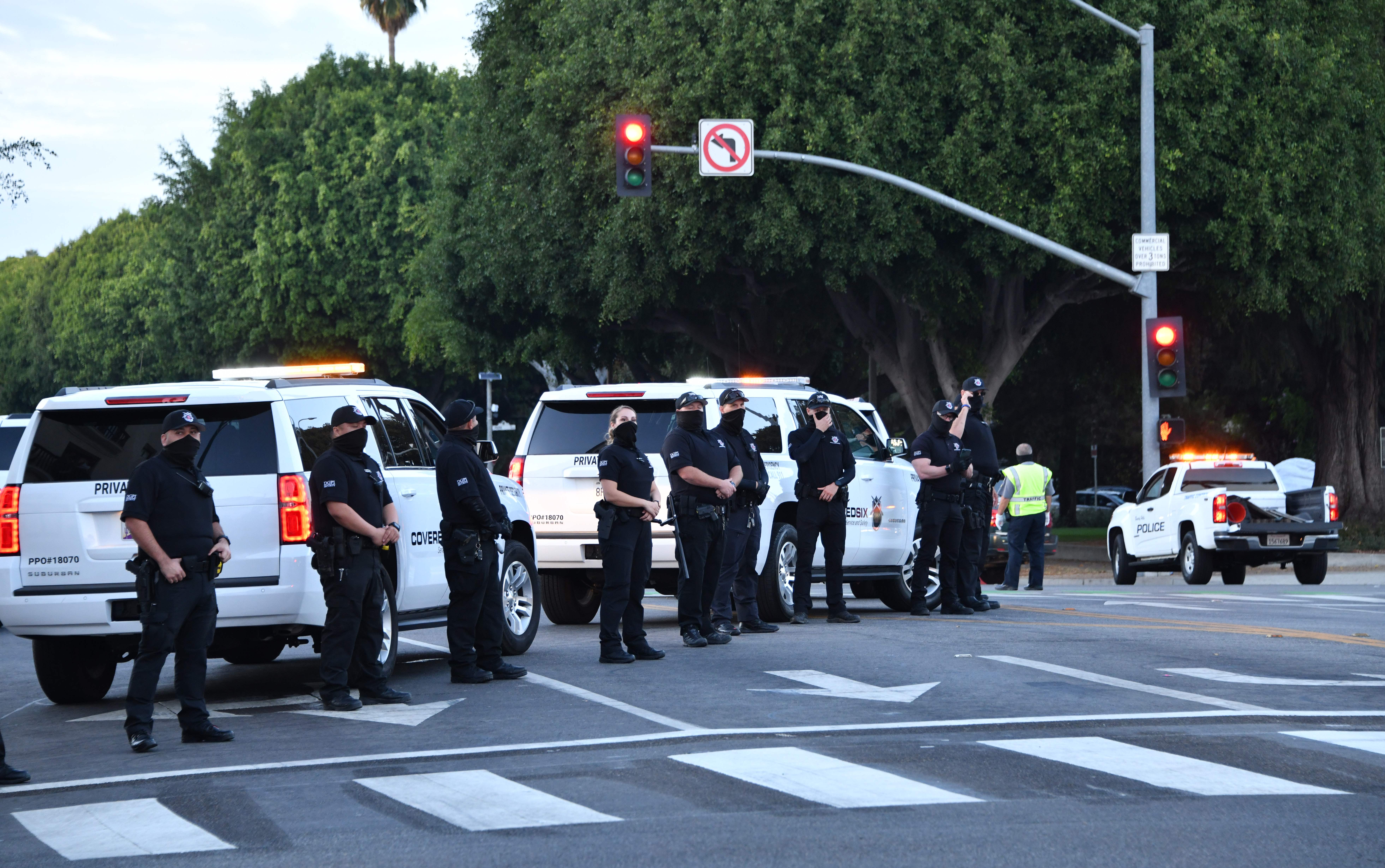 <p>Police officers direct traffic during a pro-Trump demonstration in Beverly Hills, November 1, 2020.</p>