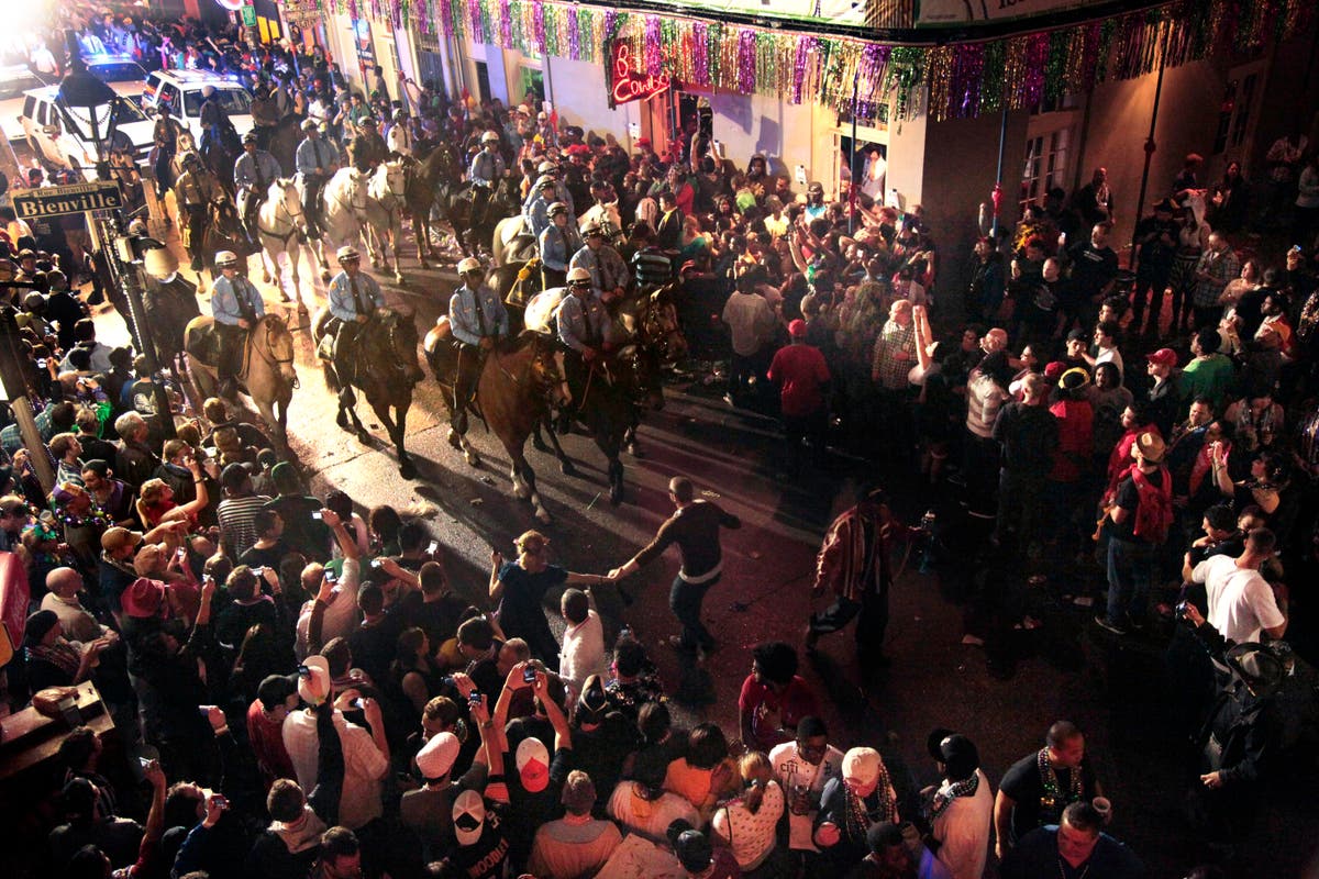 Muted Mardi Gras: Closed bars, barricaded Bourbon Street Muted Mardi Gras: Closed bars, barricaded Bourbon Street