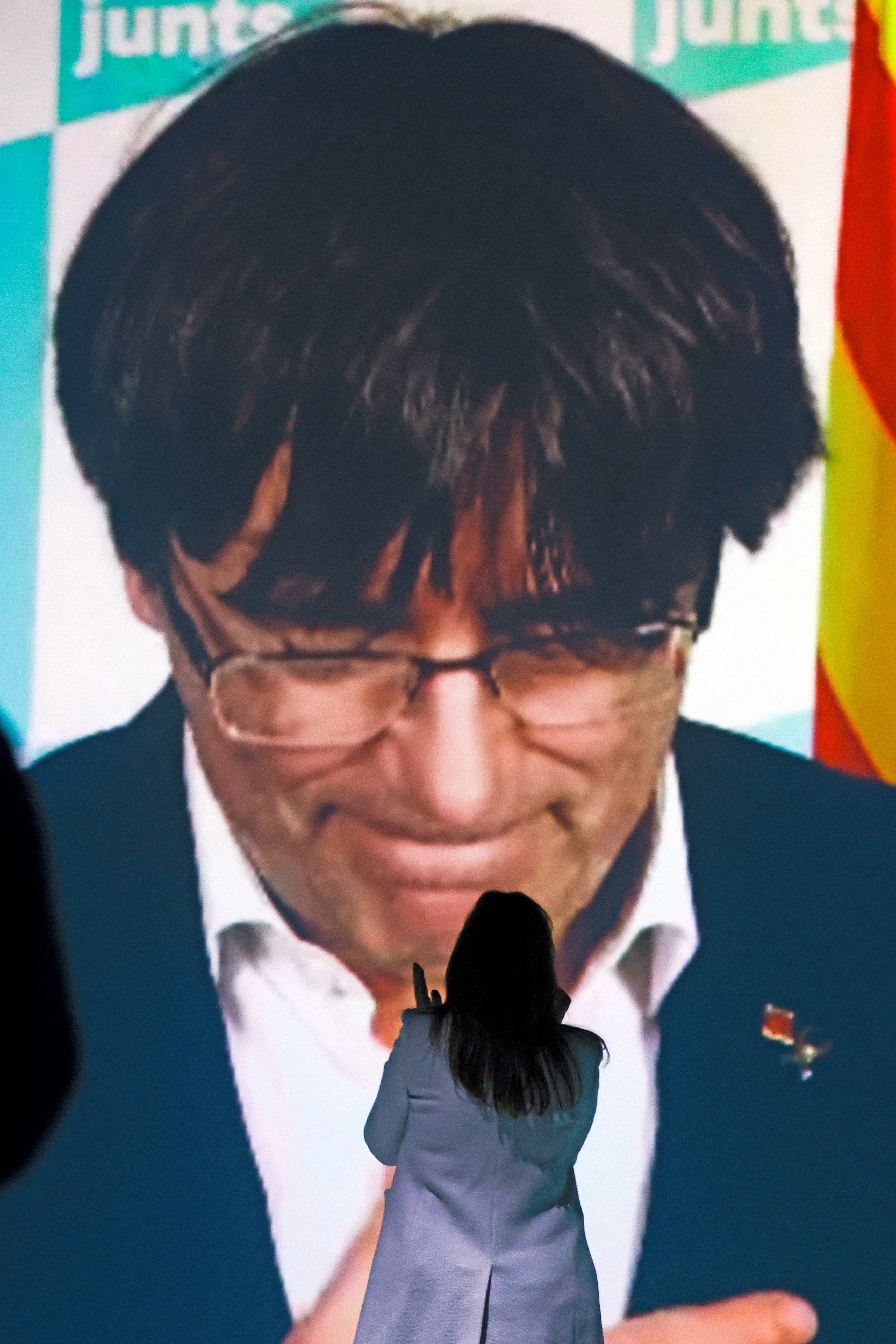 Carles Puigdemont delivers a speech via video conference