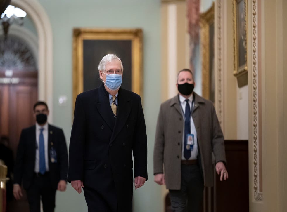 Senate Minority Leader Mitch McConnell, R-Ky., arrives as the Senate convenes in a rare weekend session for final arguments in the second impeachment trial of former President Donald Trump