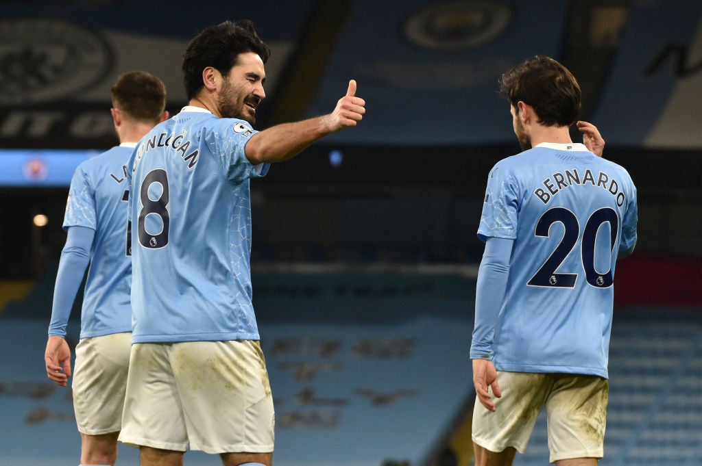 Ilkay Gundogan celebrates scoring