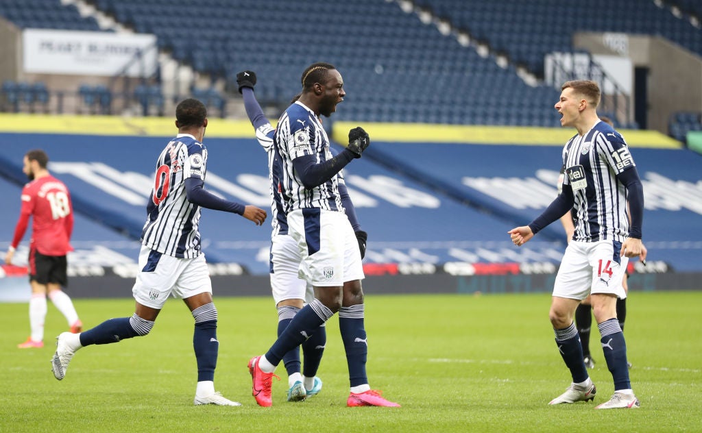 Mbaye Diagne of West Bromwich Albion celebrates with team mate Conor Townsend