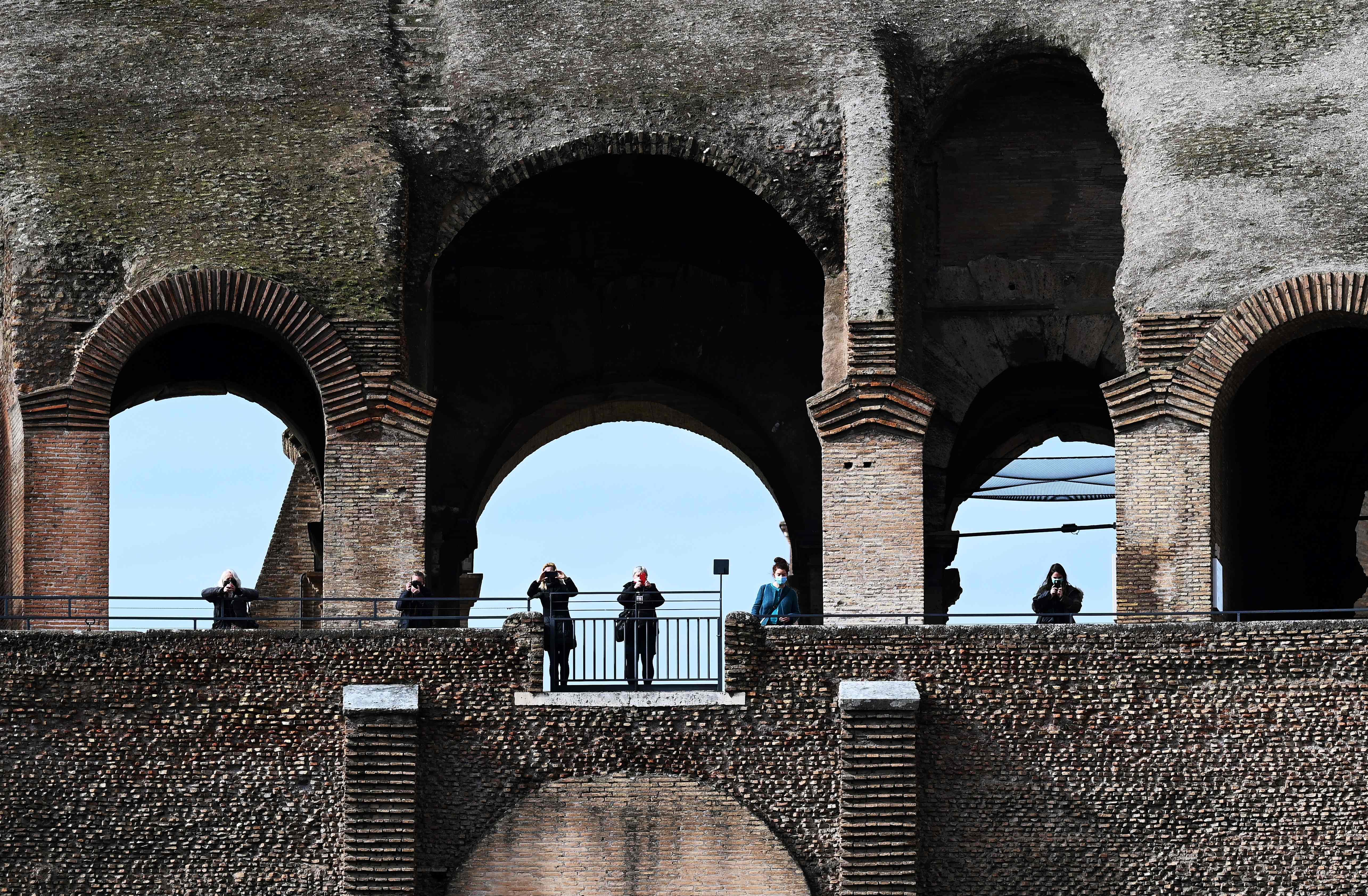 People visit Rome’s Colosseum after its reopening earlier this month