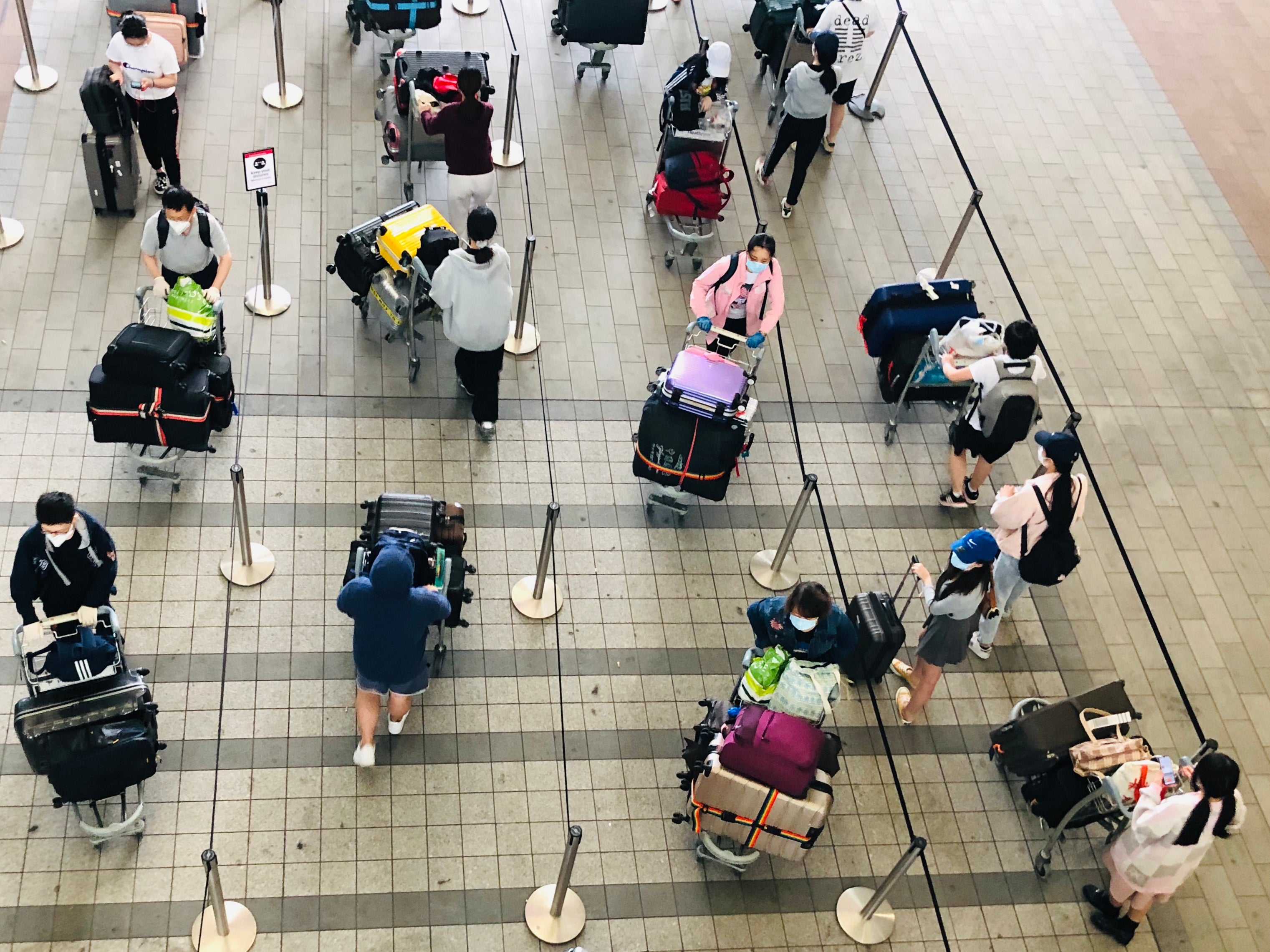 Waiting game: passengers at Heathrow airport