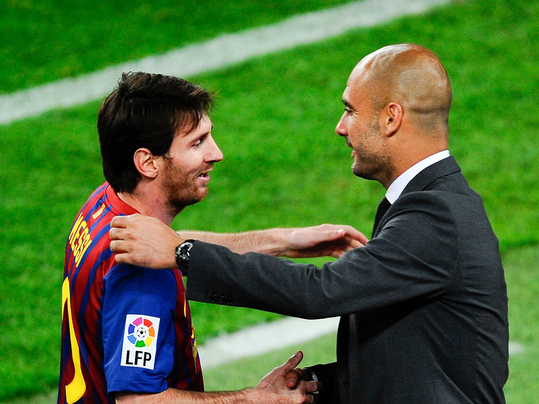 Pep Guardiola with Lionel Messi during the former’s time as Barcelona coach