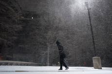 Blackouts and cancelled flights for thousands as winter storm keeps hammering US