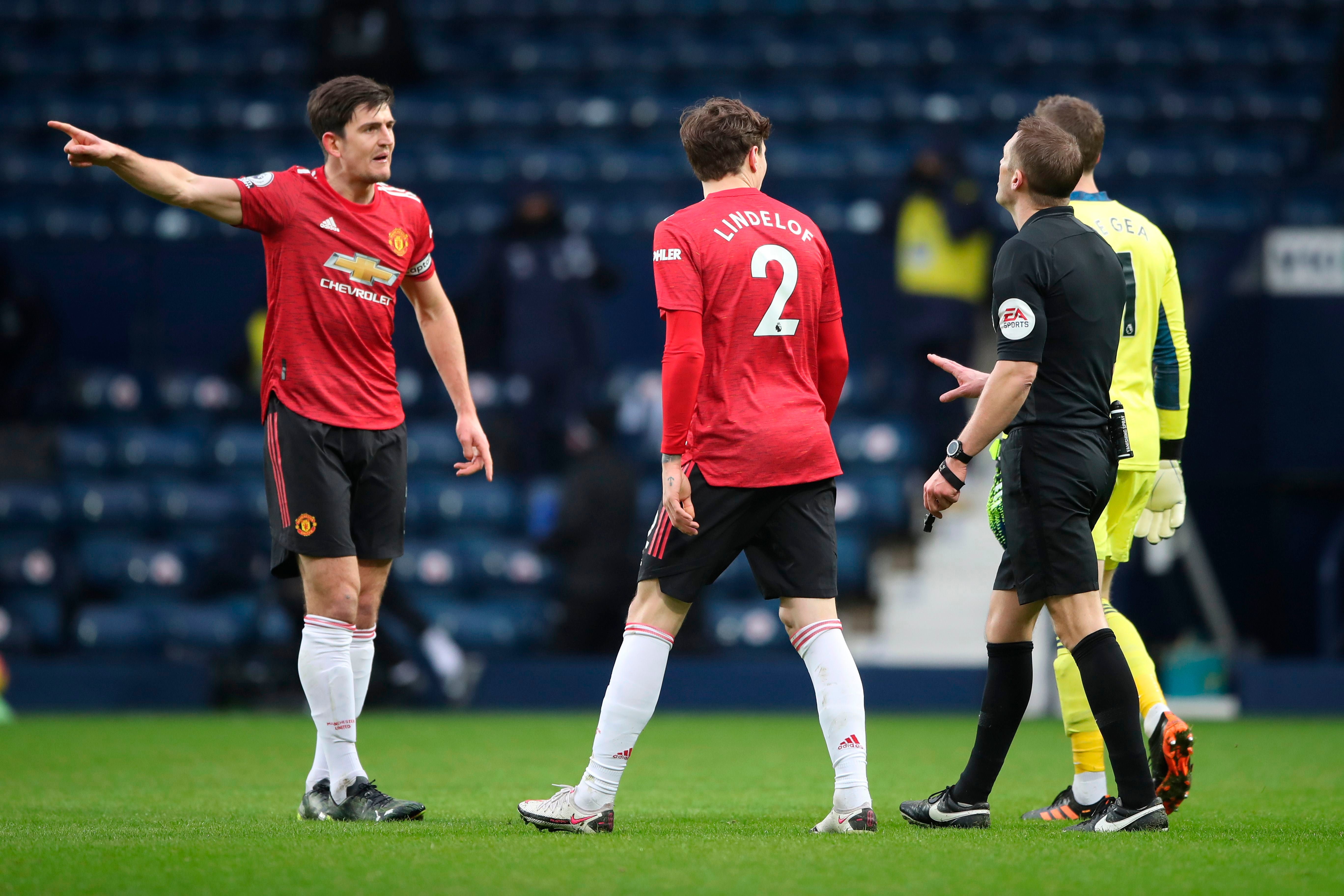 Maguire remonstrates with referee Craig Pawson