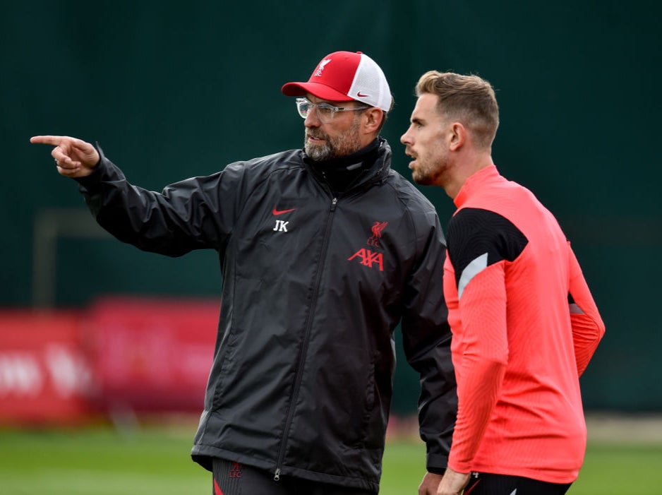<p>Jurgen Klopp and Jordan Henderson in Liverpool training</p>
