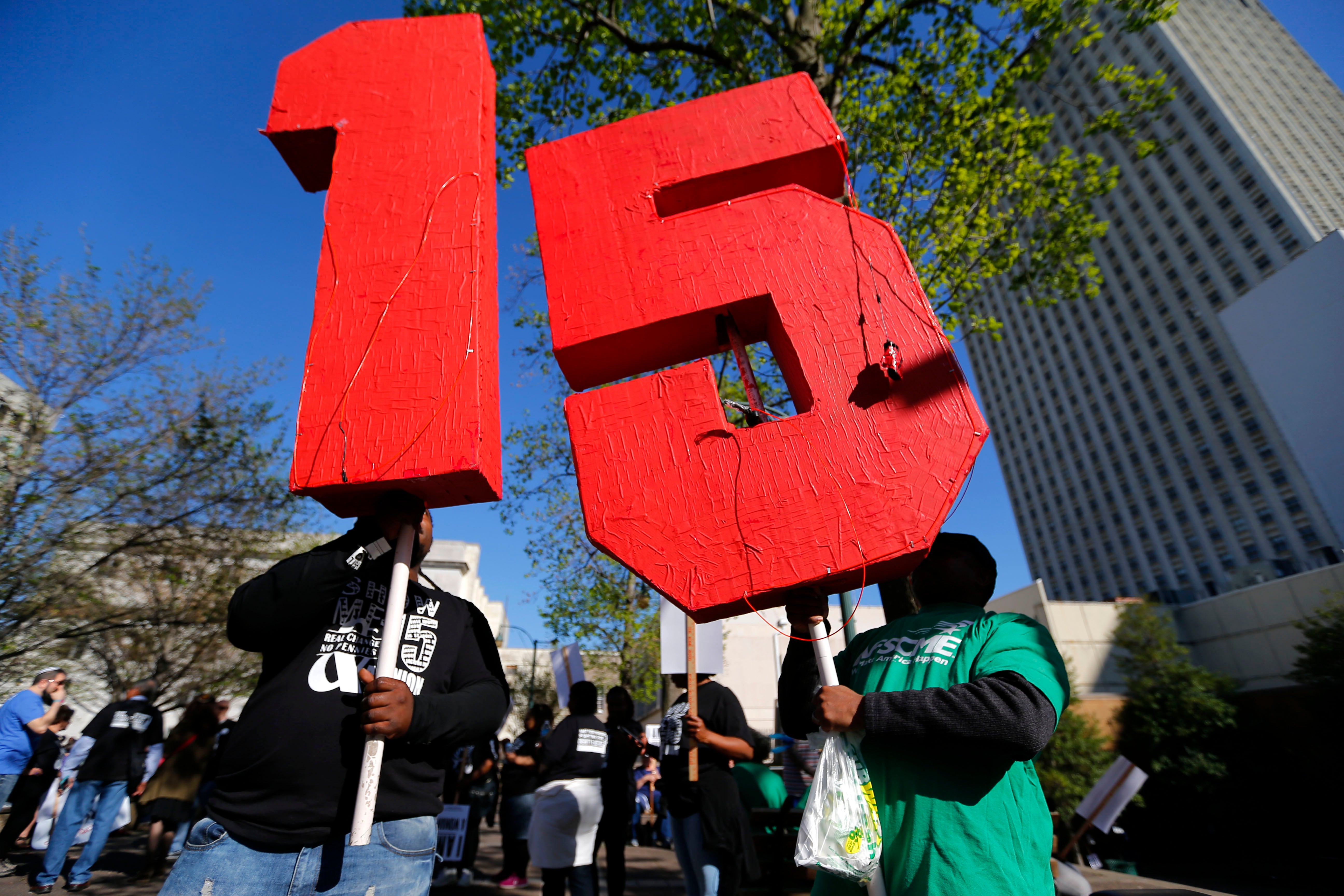 Workers lead a Fight for $15 march in Memphis, Tennessee in 2017.