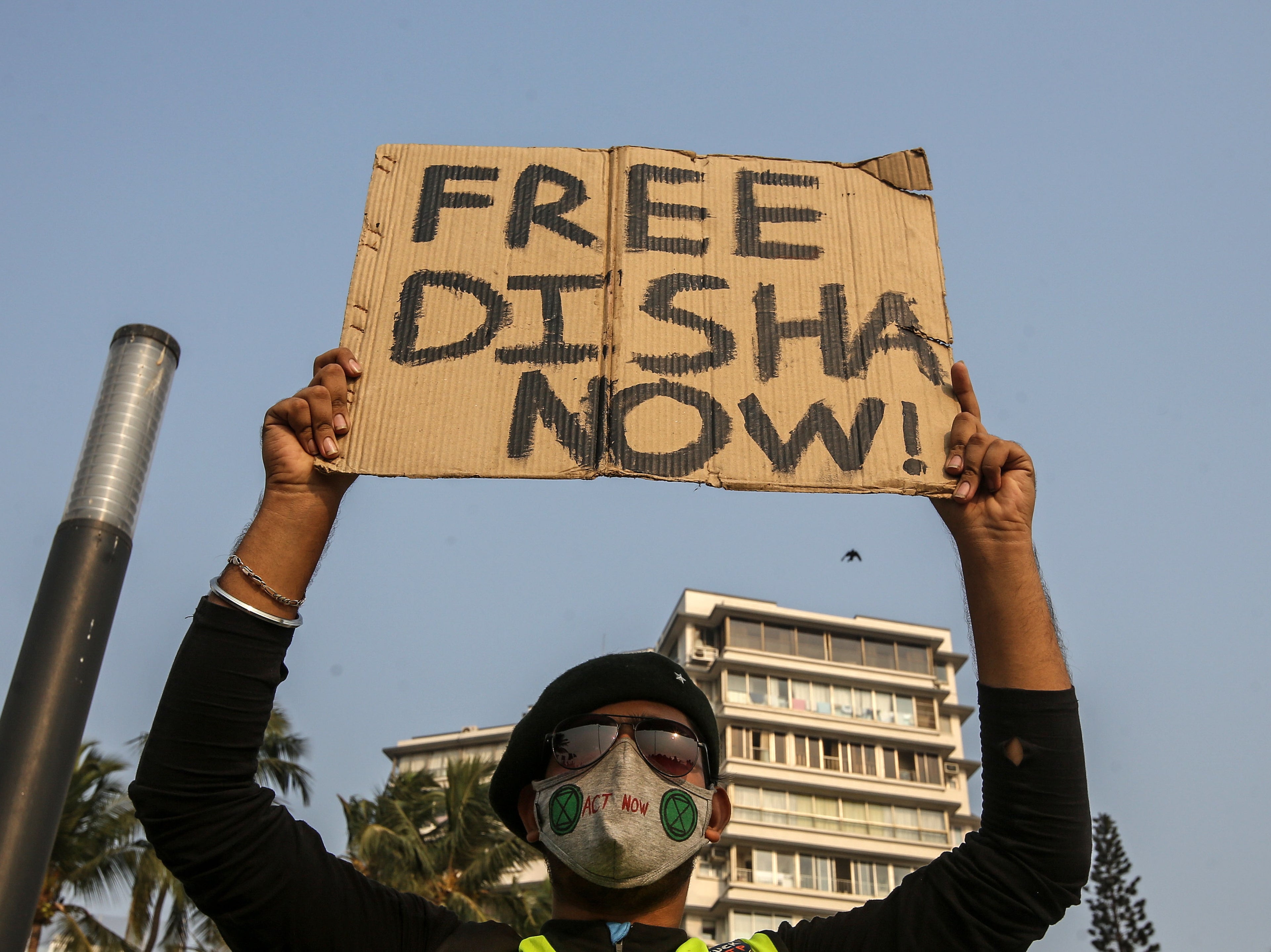 A protester demands the release of climate activist Disha Ravi after her arrest by the Delhi police in connection with a toolkit shared by Greta Thunberg
