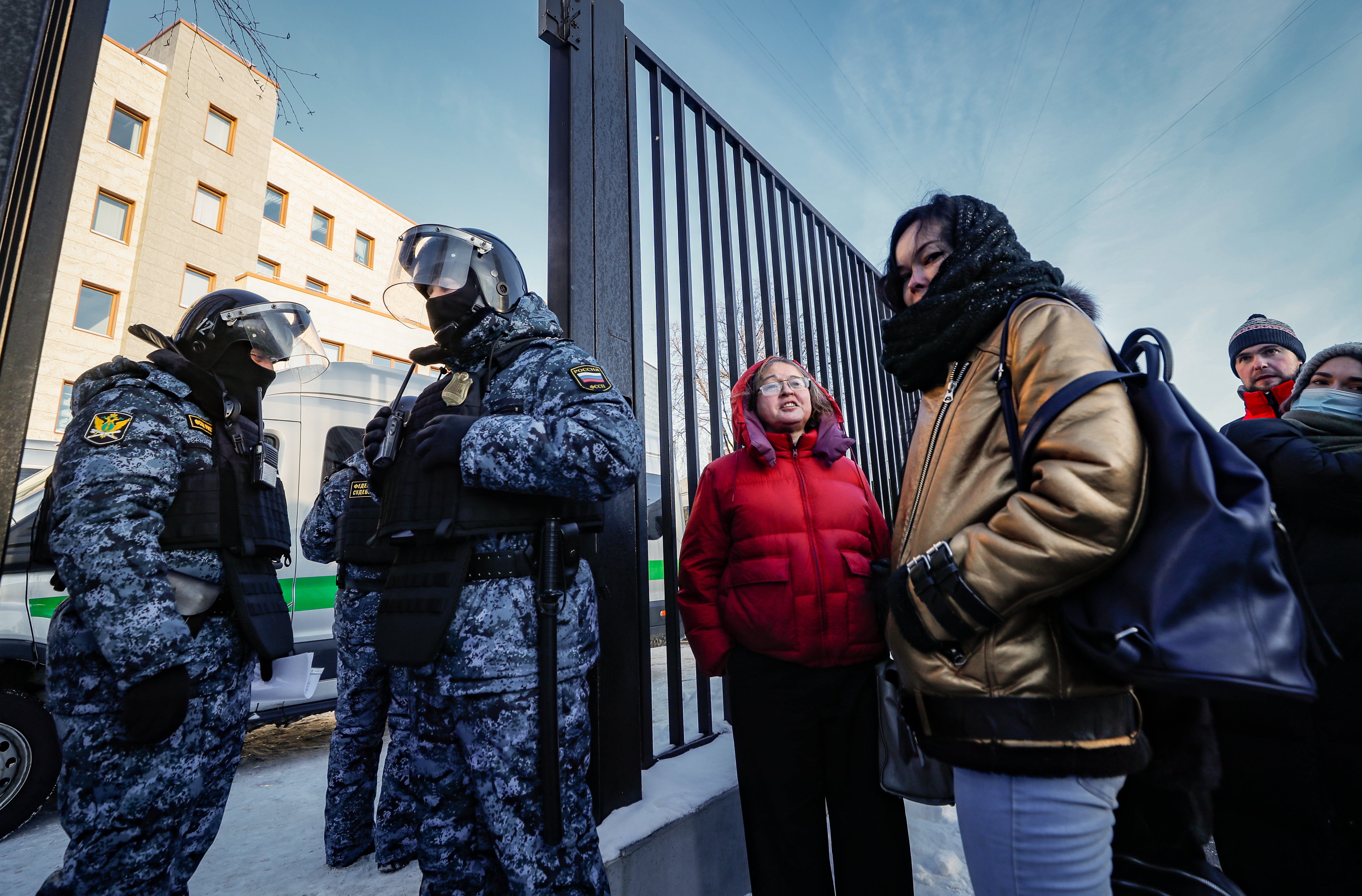 Russian police officers stand guard near the Babushkinsky district court in Moscow