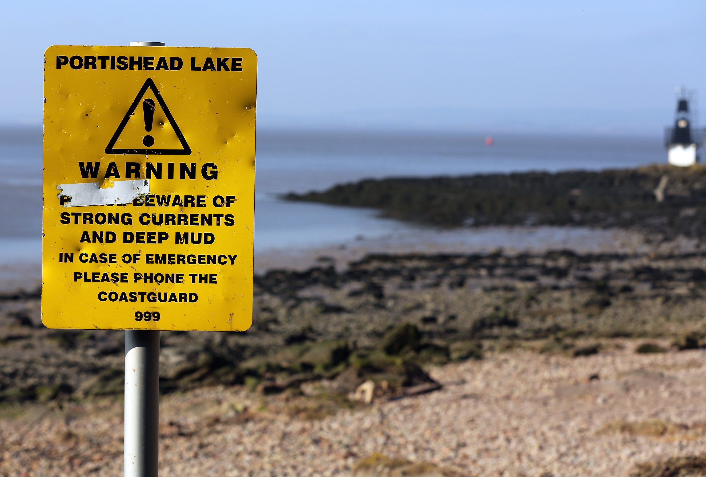 A sign warns of dangerous tides besides the Severn Estuary at Portishead. The new barrage could supply 5 per cent of the UK’s electricity and create thousands of jobs