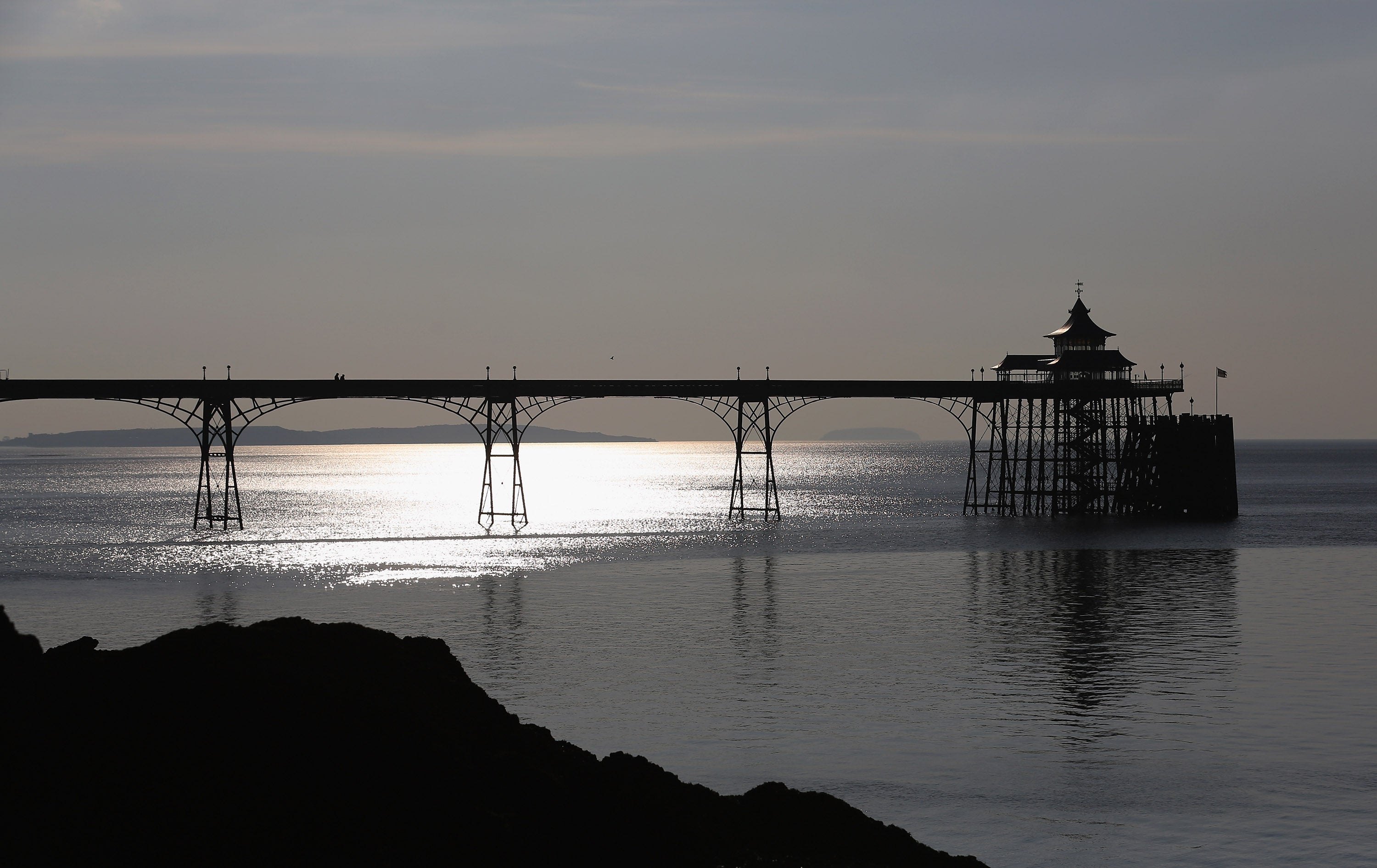 The sun reflects off the calm waters of the Severn Estuary at Clevedon