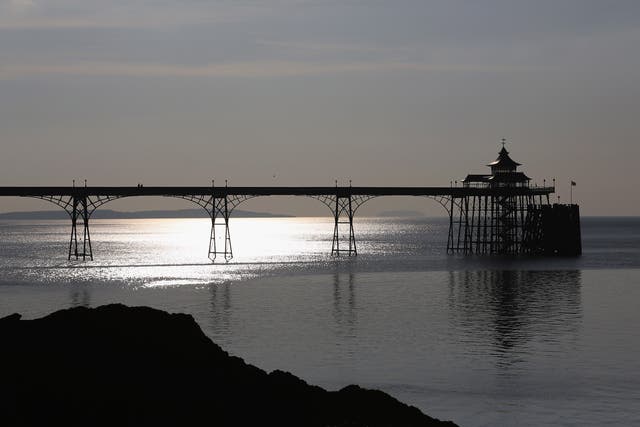 <p>The sun reflects off the calm waters of the Severn Estuary at Clevedon</p>