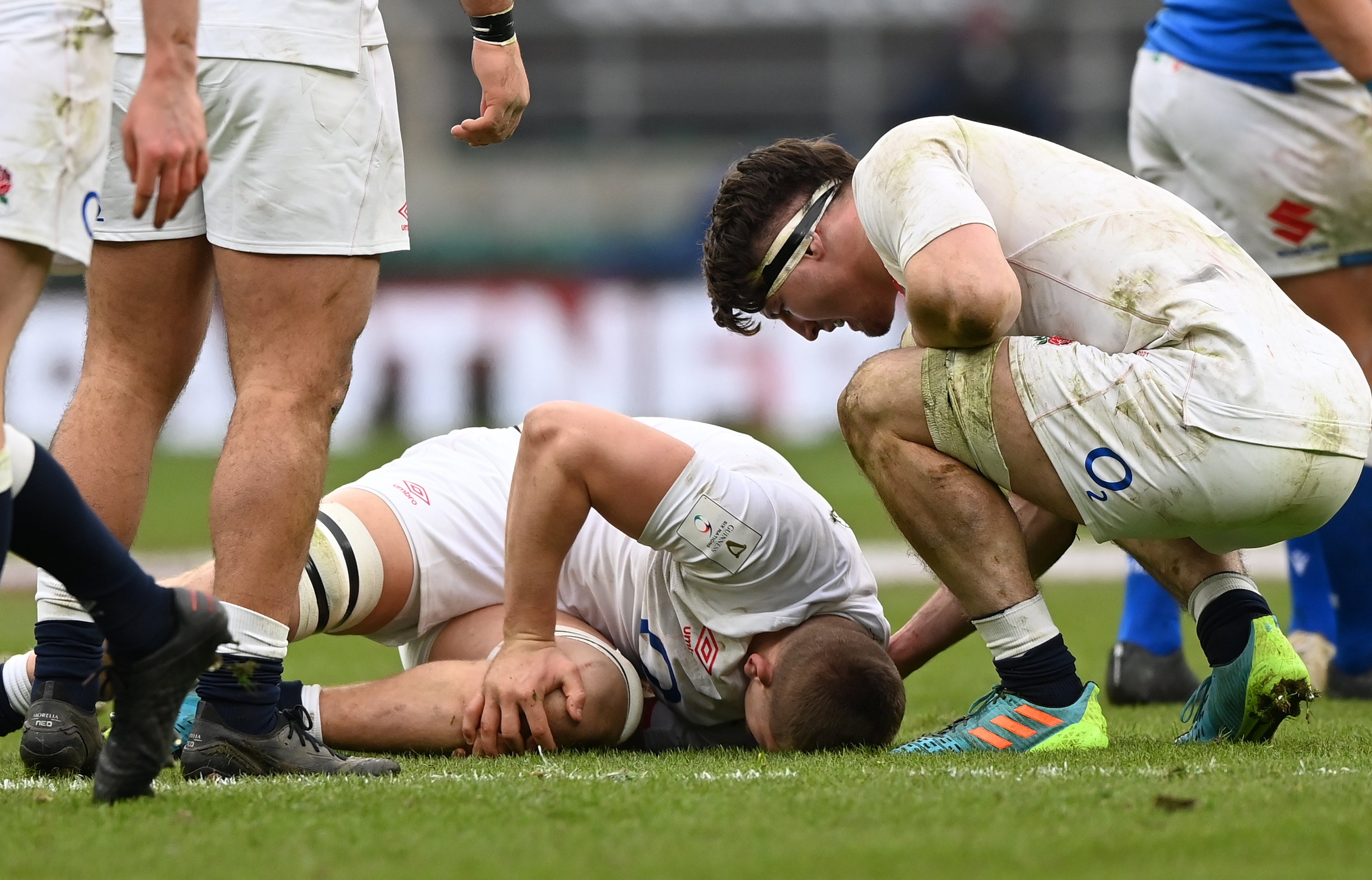 Jack Willis holds his knee in pain during the Six Nations