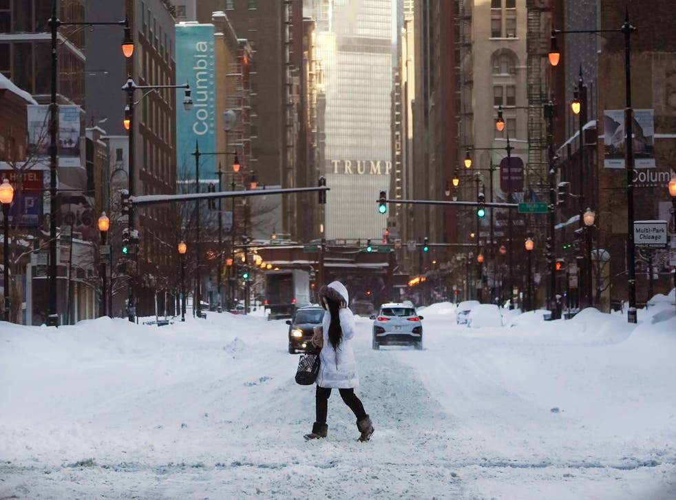 The Latest Chicago area hit with more than a foot of snow Schools Snow