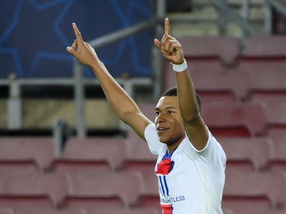 Kylian Mbappe celebrates completing his hat-trick