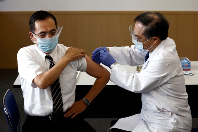 APTOPIX Virus Outbreak Japan Vaccine