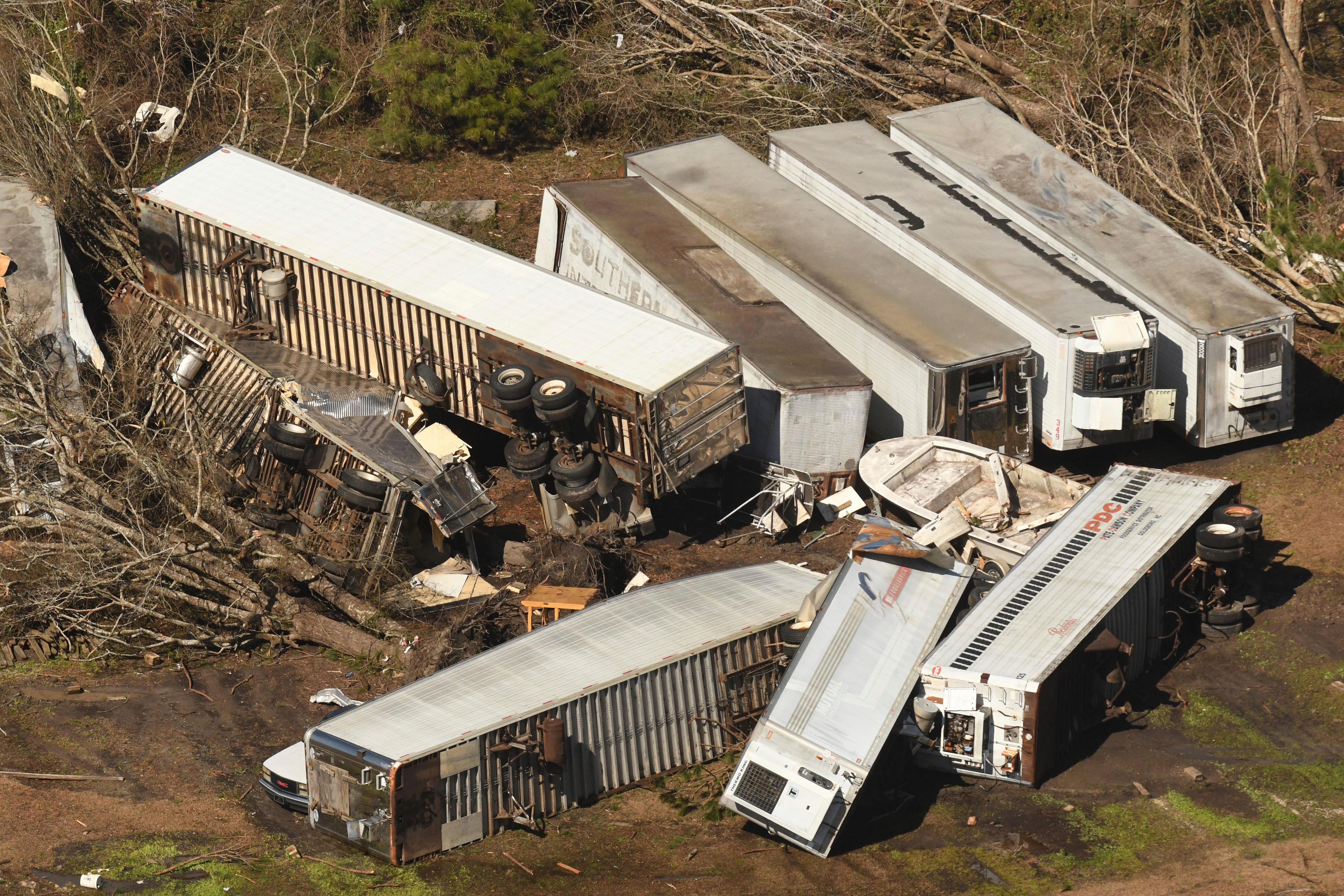 Tractor-trailers were blown away with the force of winds