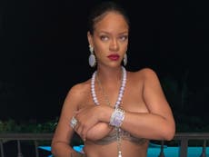 Rihanna accused of cultural appropriation over topless photo of herself wearing religious pendant