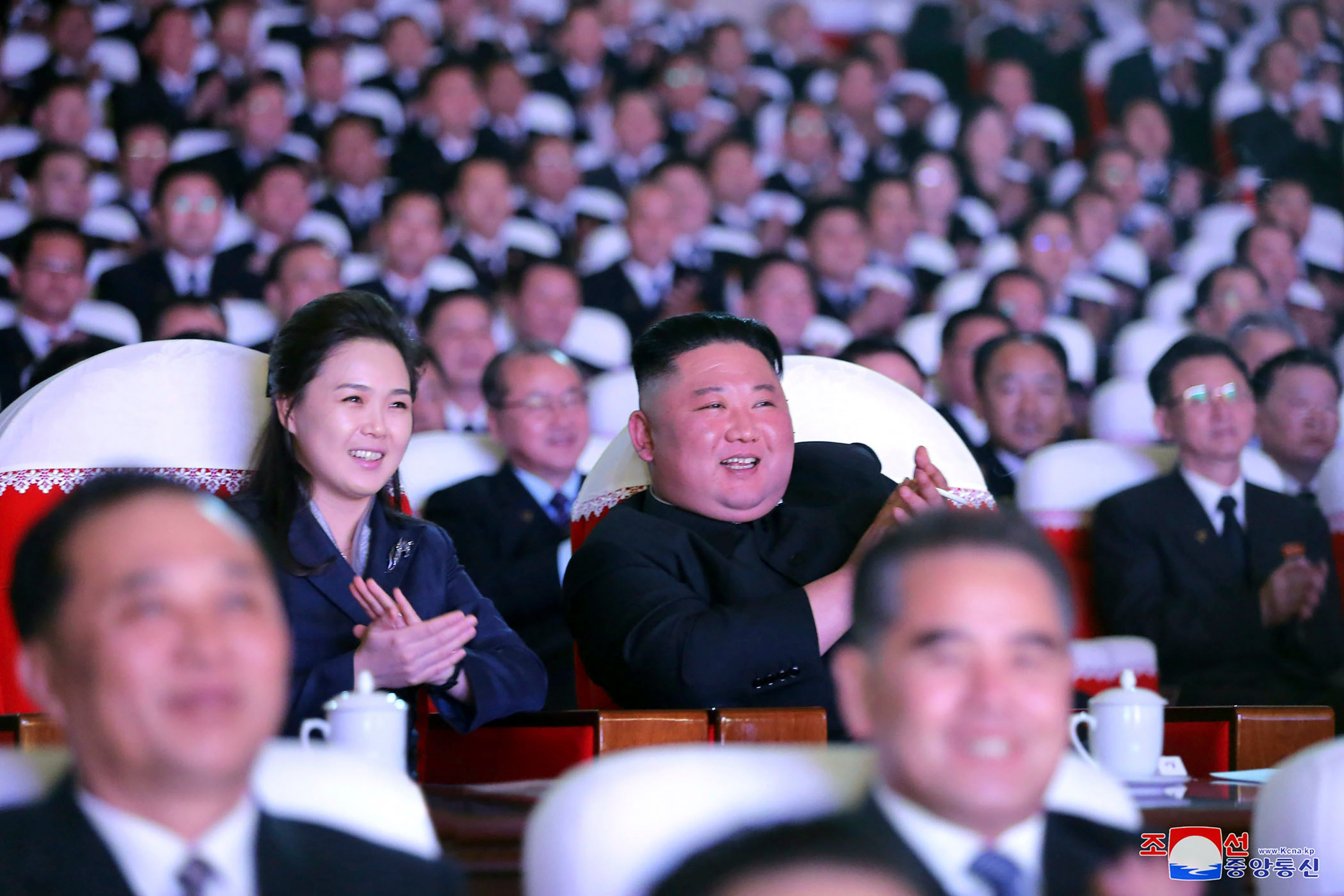 North Korean leader Kim Jong-un and his wife Ri Sol-ju watch a performance marking the birth anniversary of Kim Jong-il in Pyongyang
