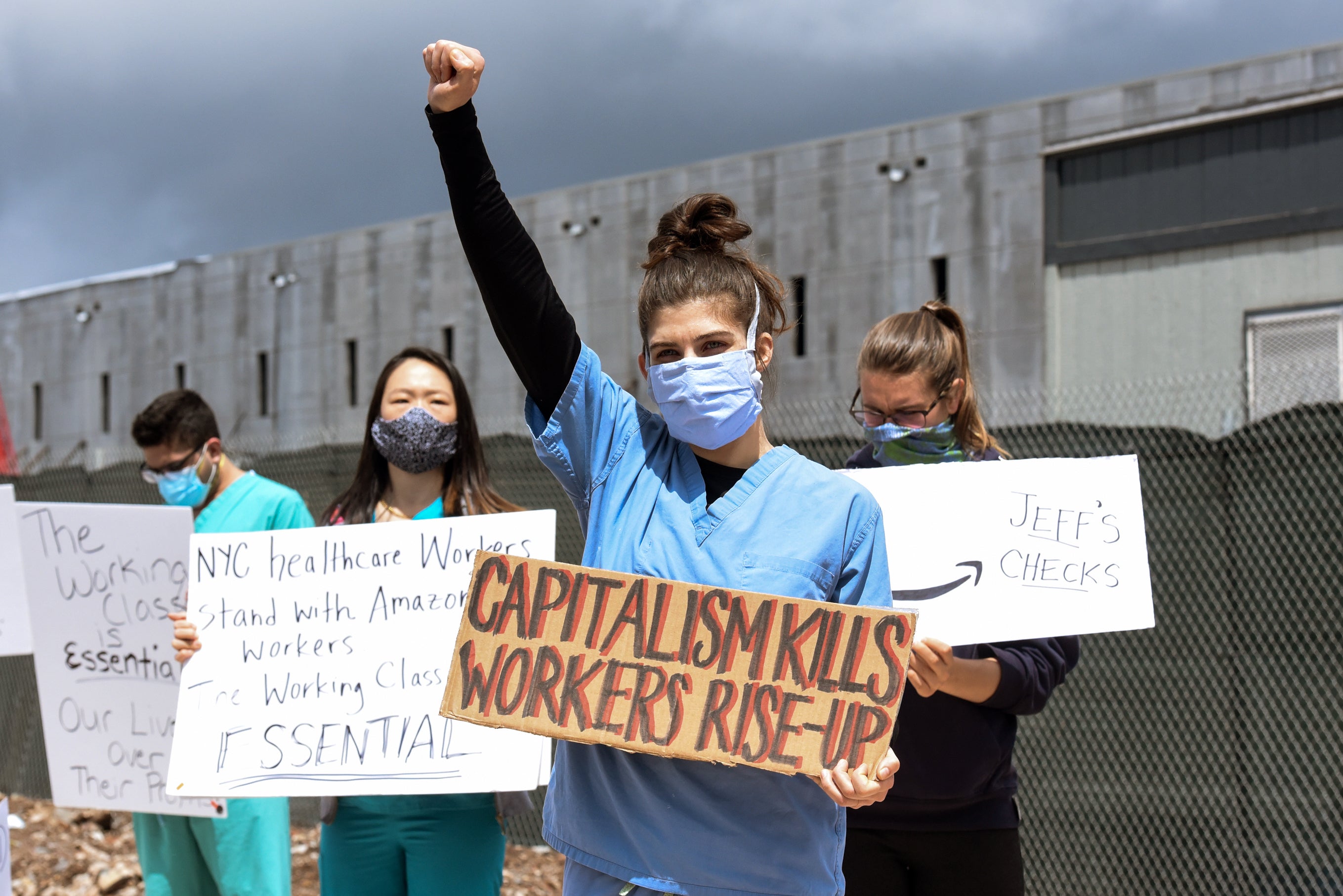 Company also accused of retaliating illegally when employees complained (Pictured: Staten Island protest in May 2020)