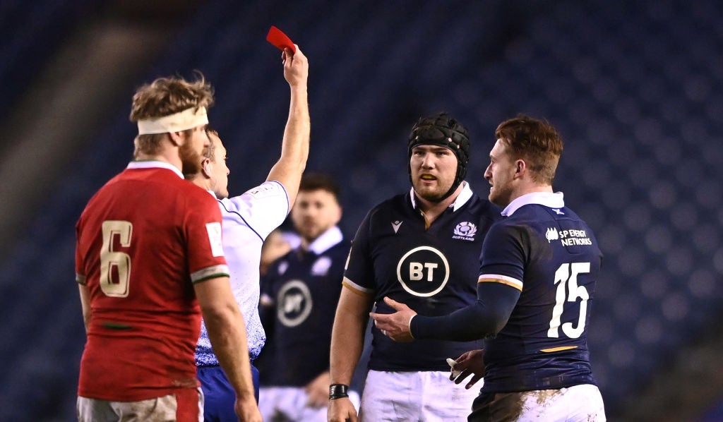 Scotland player Zander Fagerson reacts after being sent off