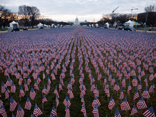 <p>Thousands of US flags are seen at the National Mall, as part of a memorial paying tribute to the U.S. citizens who have died from the coronavirus disease (COVID-19), near the Capitol ahead of President-elect Joe Biden’s inauguration, in Washington, DC, on 18 January 2021</p>