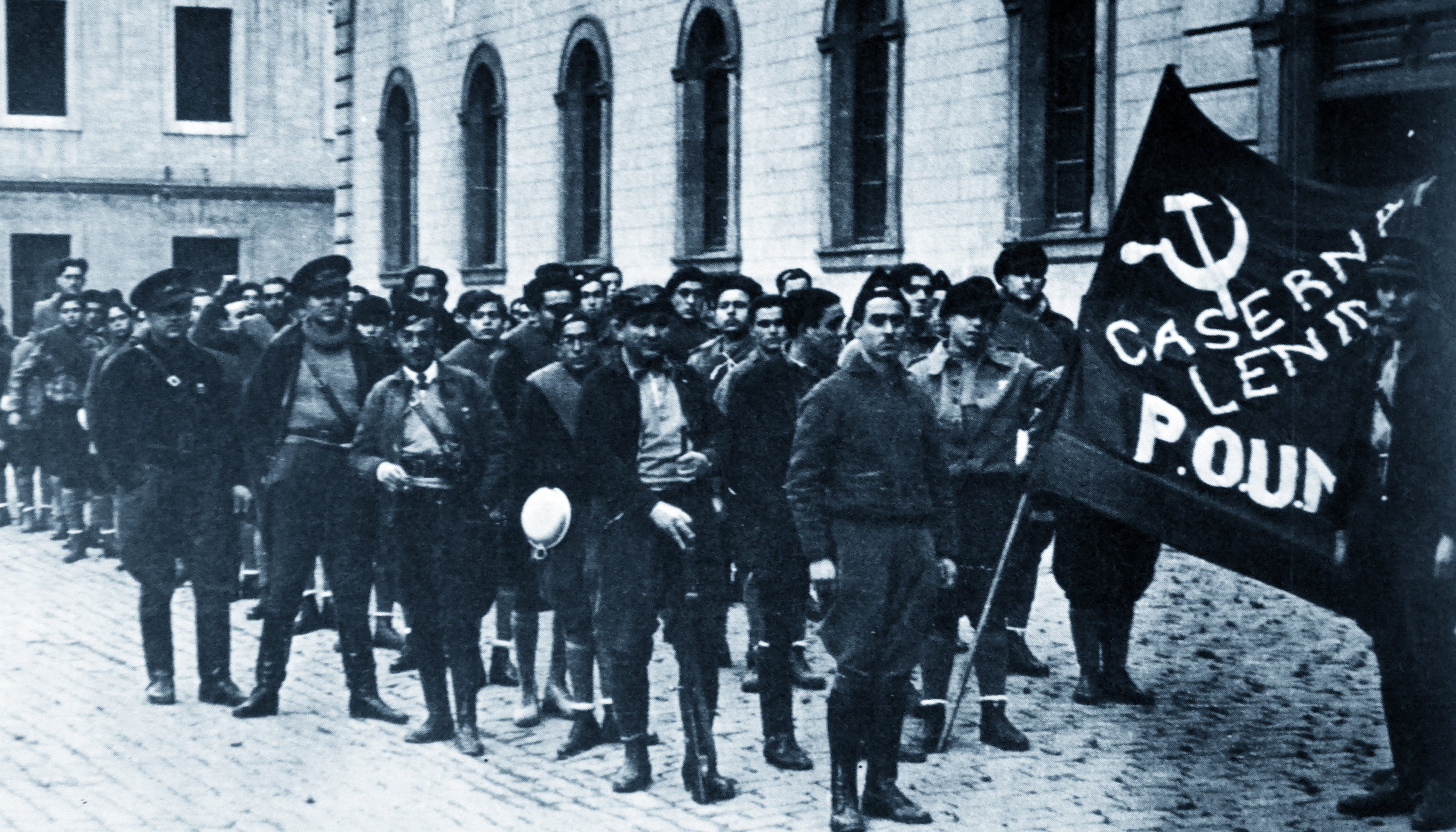 Orwell (at the back) in Barcelona during the Spanish Civil War, where he was shot in the neck