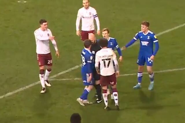 Referee Darren Drysdale was involved in an apparent confrontation with Ipswich midfielder Alan Judge