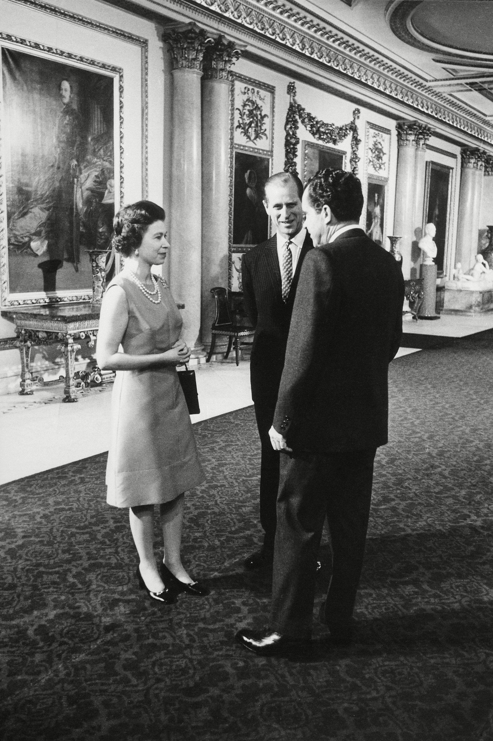 President Nixon chats with Queen Elizabeth II and Prince Phillip at Buckingham Palace, 25 February 1969