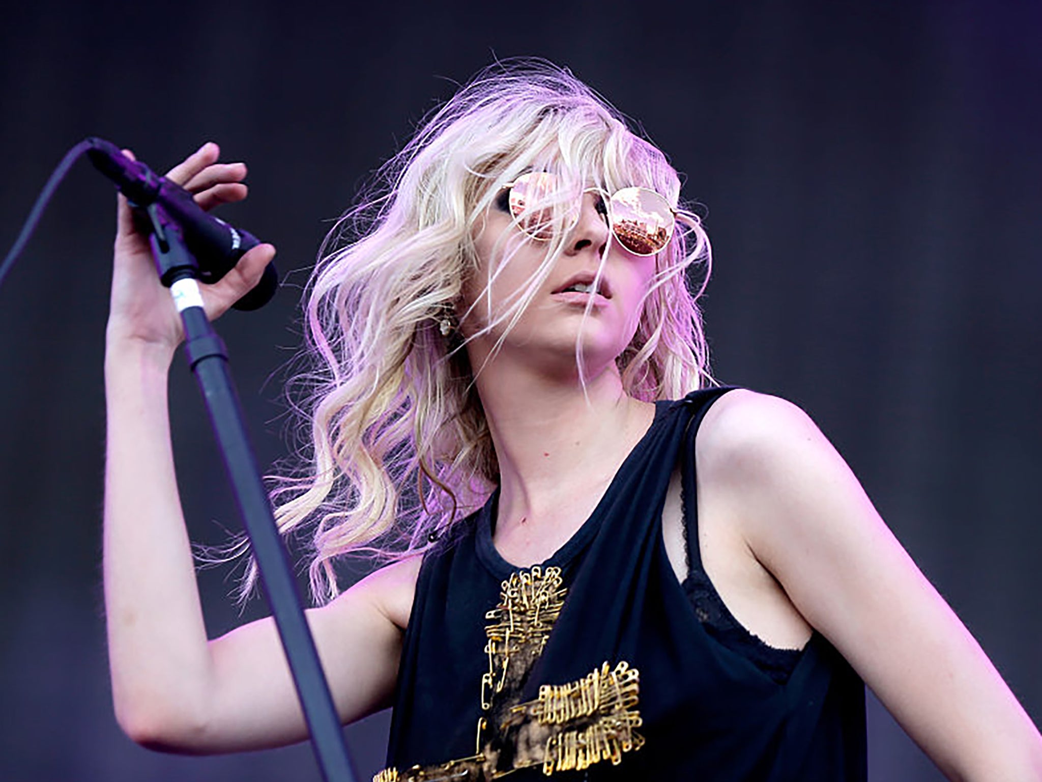 Taylor Momsen on stage with her band The Pretty Reckless