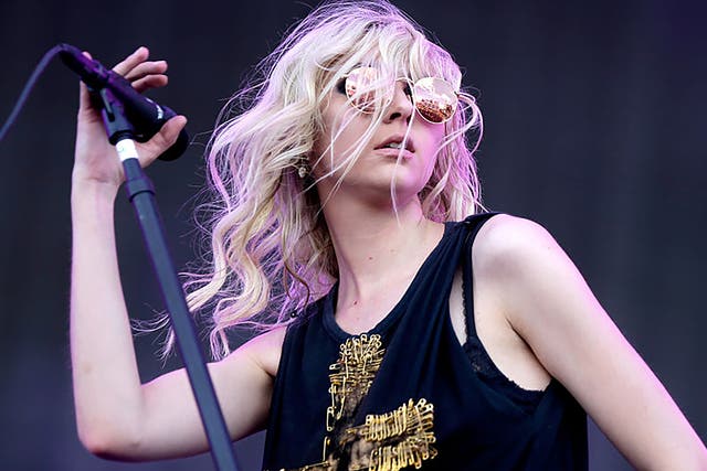 Taylor Momsen on stage with her band The Pretty Reckless
