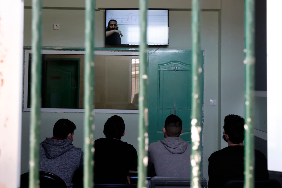DIY education: Greek teacher creates TV classes for inmates