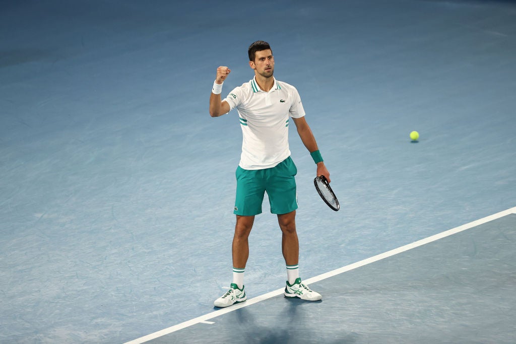 Novak Djokovic celebrates victory against Aslan Karatsev
