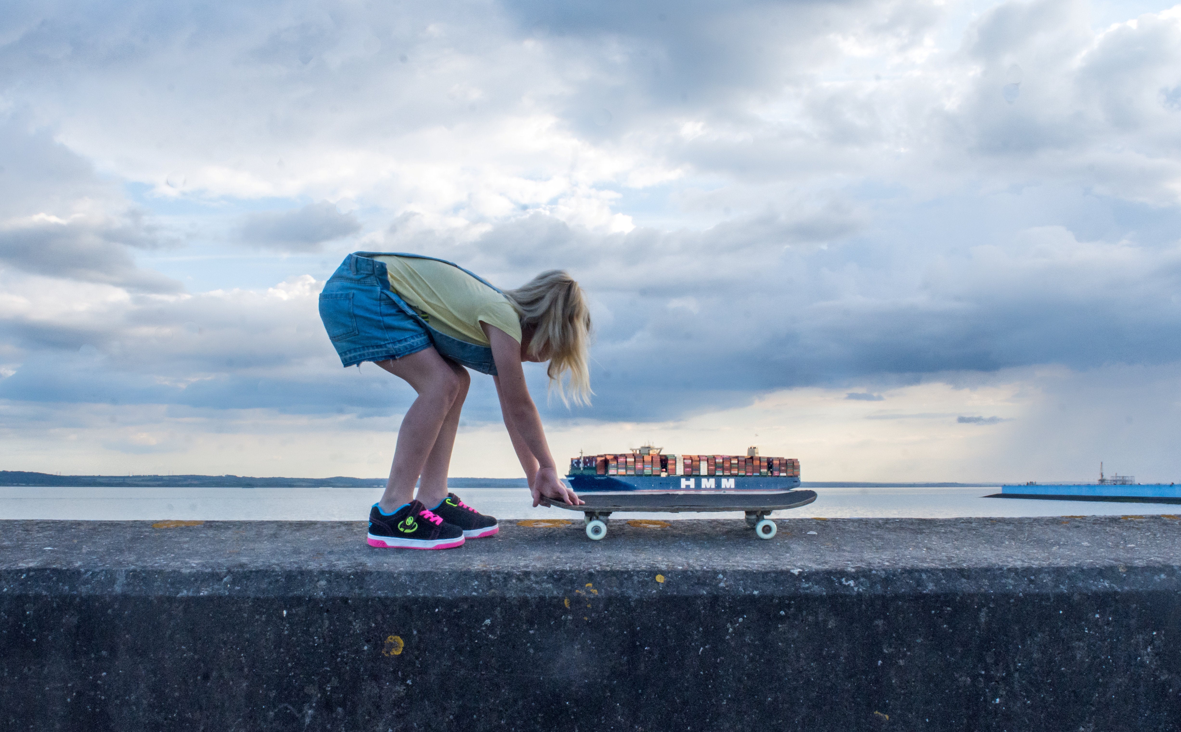 'All On Board' - A girl plays with her skateboard
