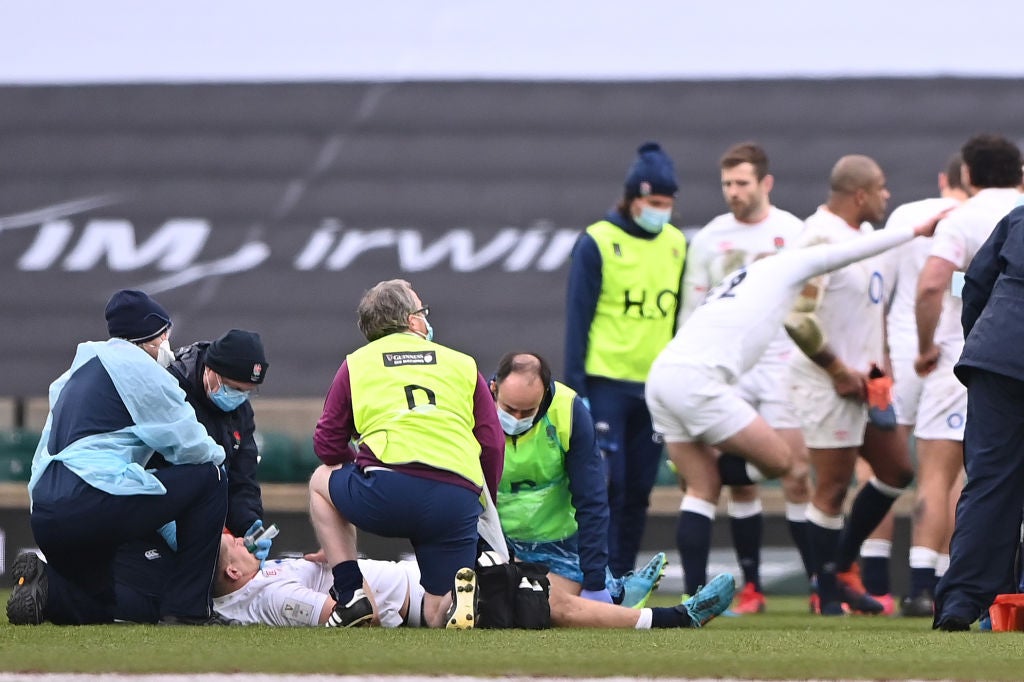Jack Willis receives medical treatment during the Six Nations match against Italy at Twickenham