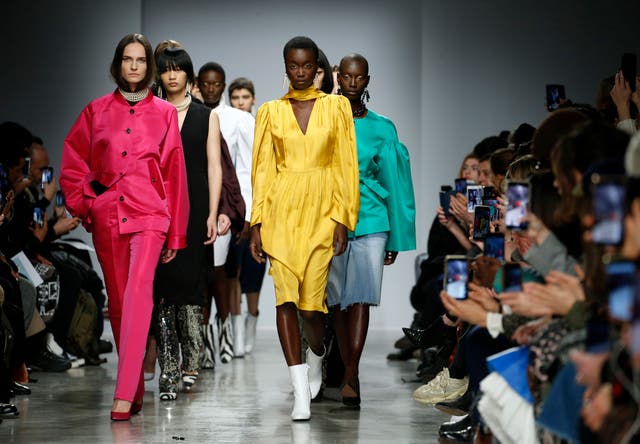 <p>Models walk the runway during the Lutz Huelle show at Paris Fashion Week last year</p>